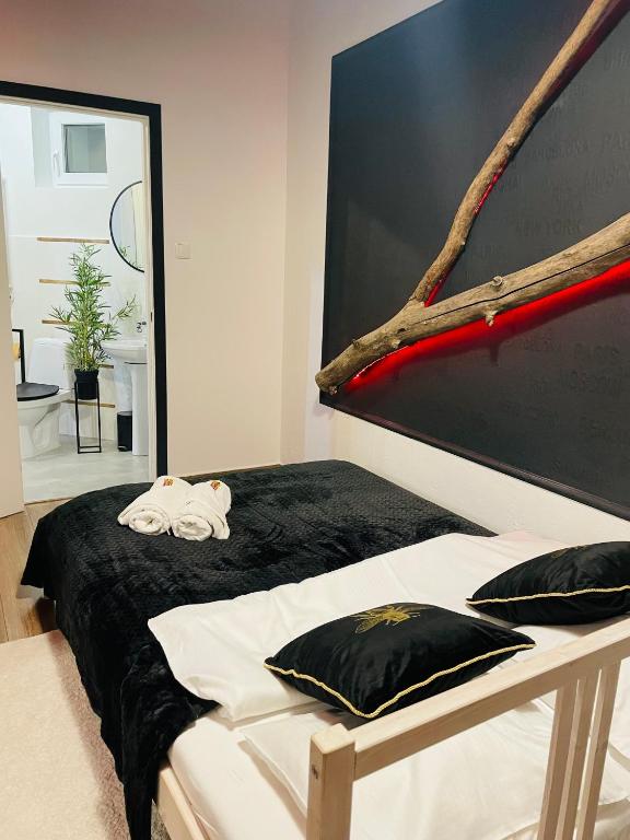 Postel nebo postele na pokoji v ubytování Apartamenty Paszkówka