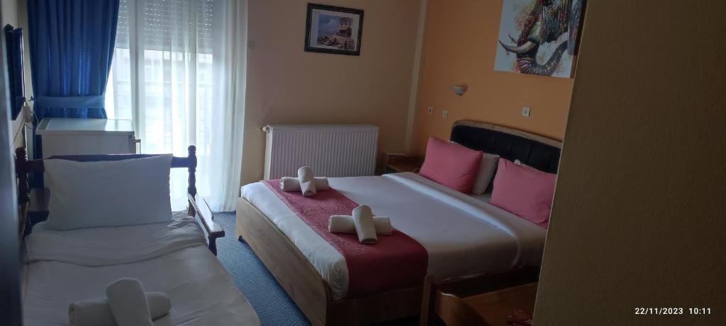 Postel nebo postele na pokoji v ubytování Hili Hotel