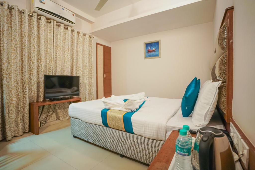 TV a/nebo společenská místnost v ubytování Pine Tree Boutique Hotel