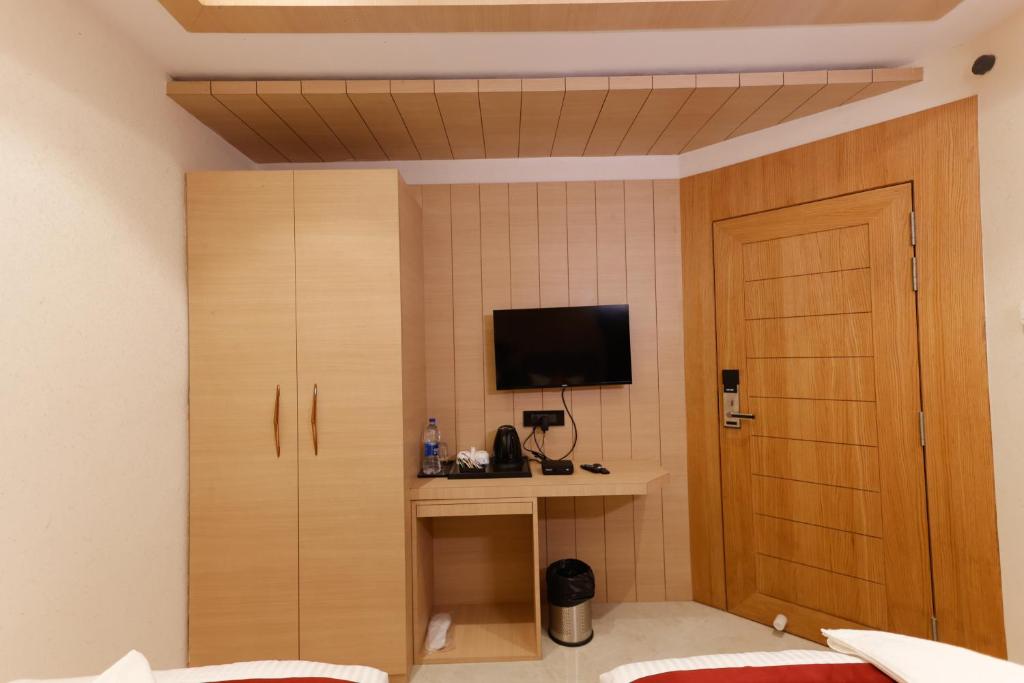 TV a/nebo společenská místnost v ubytování Hotel Sarc Inn