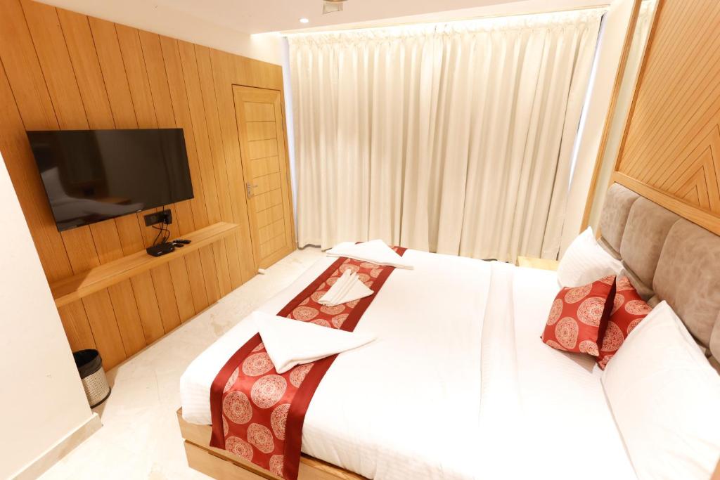 Postel nebo postele na pokoji v ubytování Hotel Sarc Inn