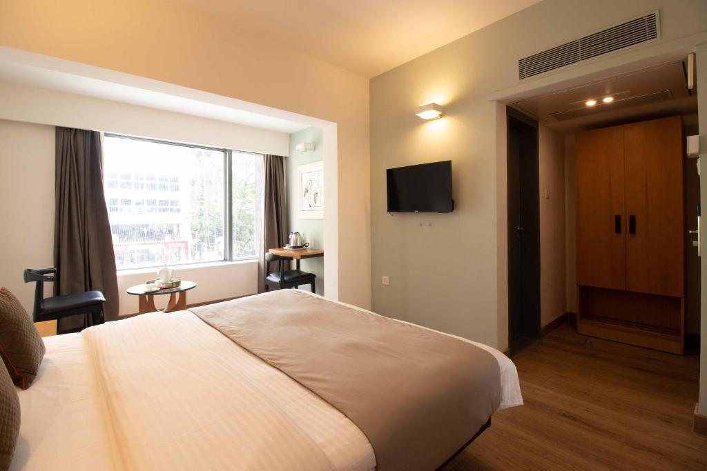 TV a/nebo společenská místnost v ubytování HOTEL LE ROYCE