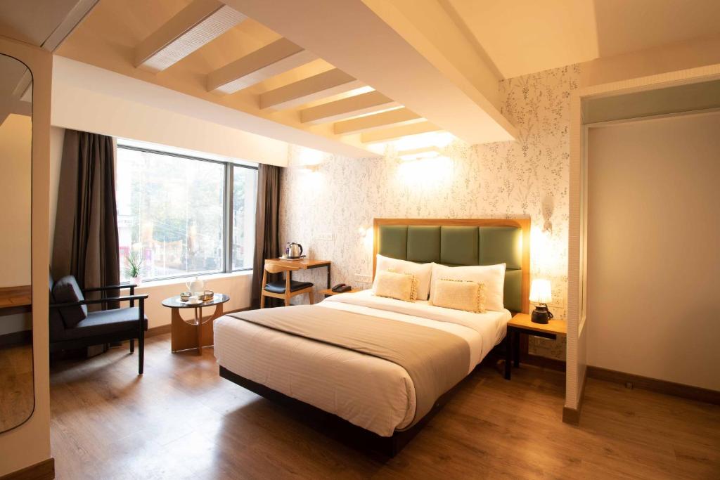 Ένα ή περισσότερα κρεβάτια σε δωμάτιο στο HOTEL LE ROYCE
