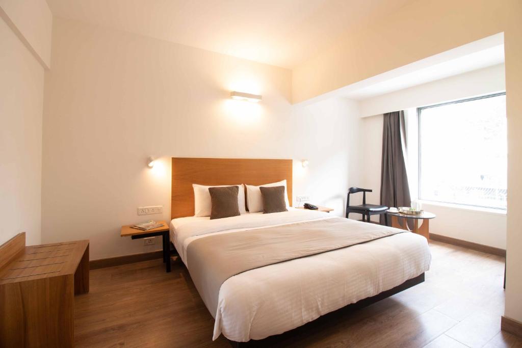 Postel nebo postele na pokoji v ubytování HOTEL LE ROYCE