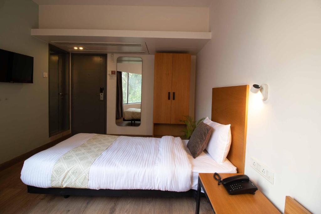 Postel nebo postele na pokoji v ubytování HOTEL LE ROYCE