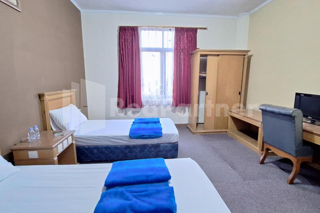 Hotel Graha Muslim RedPartner - Twin Room