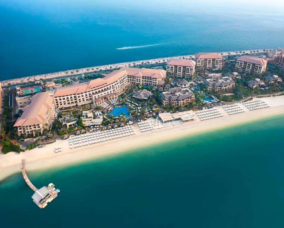 an aerial view of a resort on the beach at Sofitel Dubai The Palm Resort & Spa in Dubai