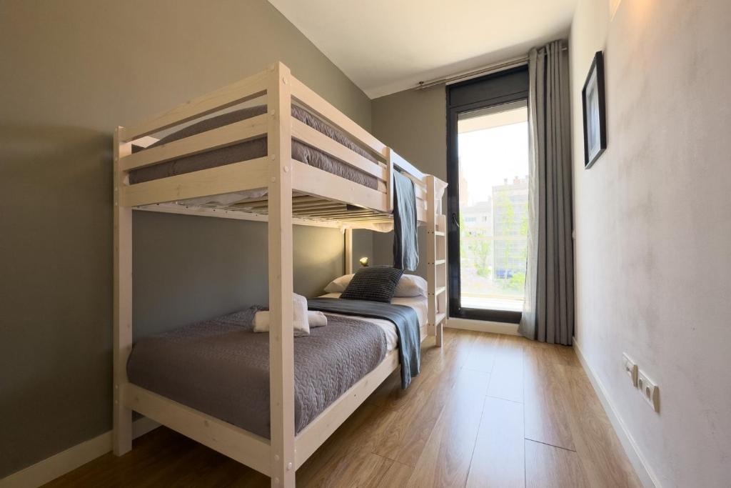 Posteľ alebo postele v izbe v ubytovaní chicStays Apartment Ciutadella Park