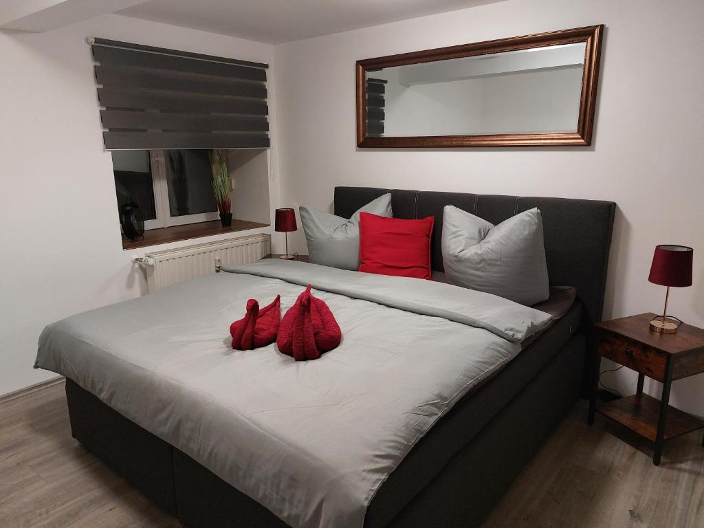 Säng eller sängar i ett rum på FeWo Gartenblick