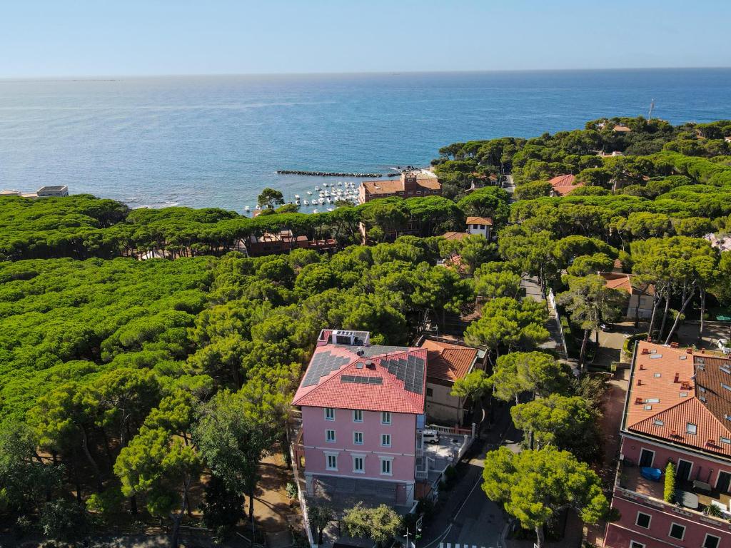 an aerial view of a town and the ocean at Castiglioncello Suite in Castiglioncello