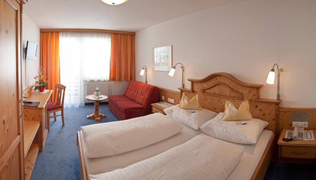 Postel nebo postele na pokoji v ubytování Hotel Wagner