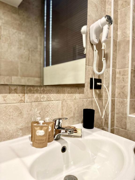 Koupelna v ubytování Hotel Giacosa