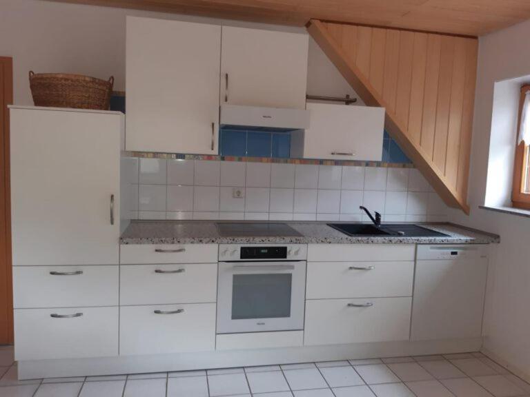 Kuchyň nebo kuchyňský kout v ubytování Ferienwohnung Lechleiter