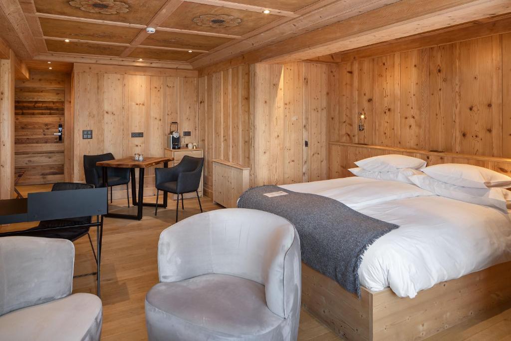 Postel nebo postele na pokoji v ubytování Aïda Hôtel & Spa - "Adults Only" Relais & Châteaux