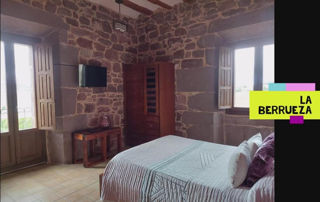 TV a/nebo společenská místnost v ubytování Hostal Rural Ioar