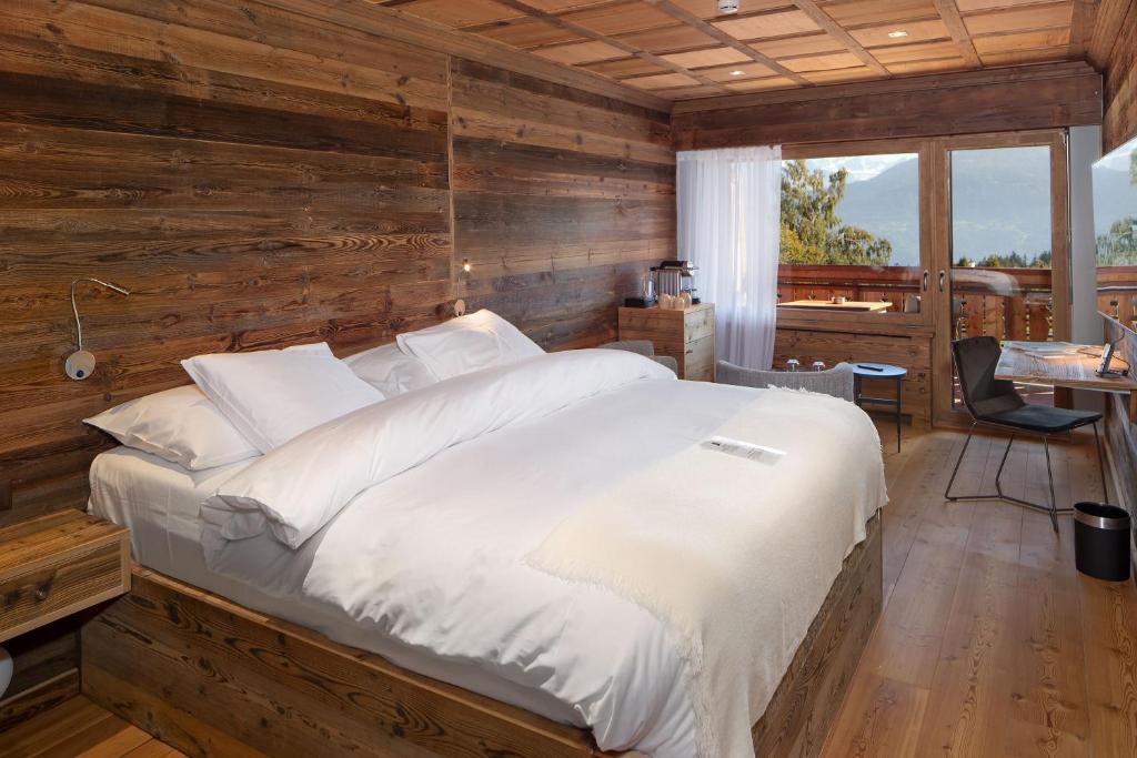 Postel nebo postele na pokoji v ubytování Aïda Hôtel & Spa - "Adults Only" Relais & Châteaux