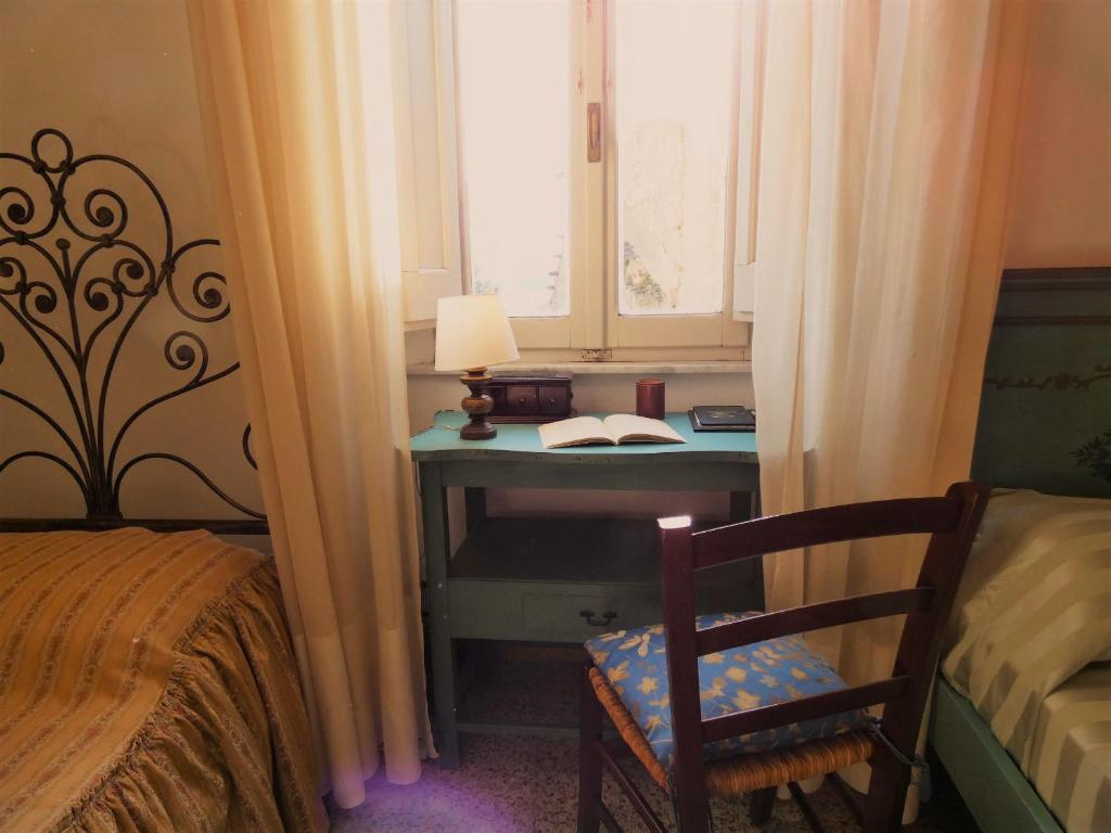 Posezení v ubytování Scappo in Umbria, la Loggia