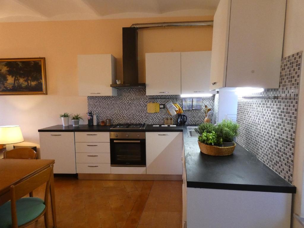 Kuchyň nebo kuchyňský kout v ubytování Scappo in Umbria, la Loggia