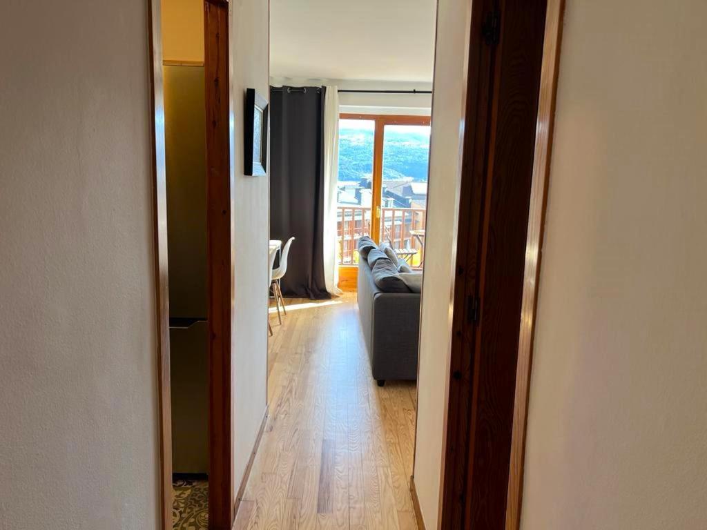 TV a/nebo společenská místnost v ubytování Apartamento en Cal Puigbó Puigcerdà