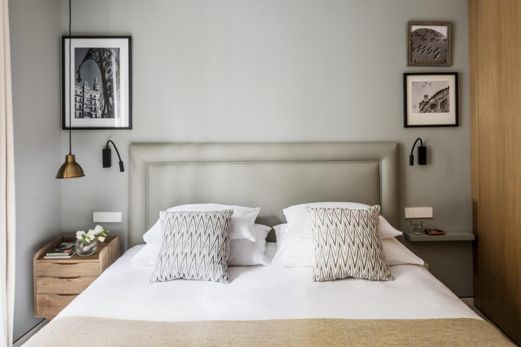מיטה או מיטות בחדר ב-The Onsider - Luxury 3 Bedroom Apartment