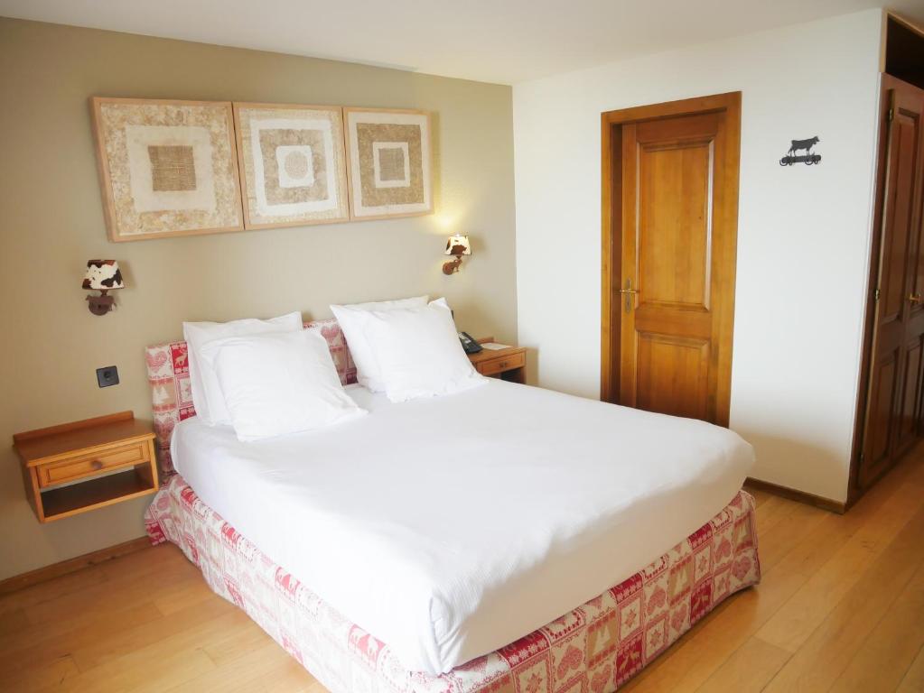 Postel nebo postele na pokoji v ubytování Between Boutique Hotel