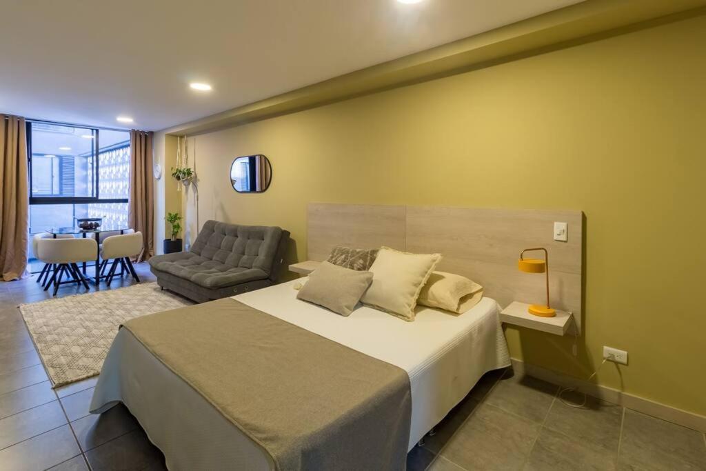 Giường trong phòng chung tại Apartamento Tranvía 210