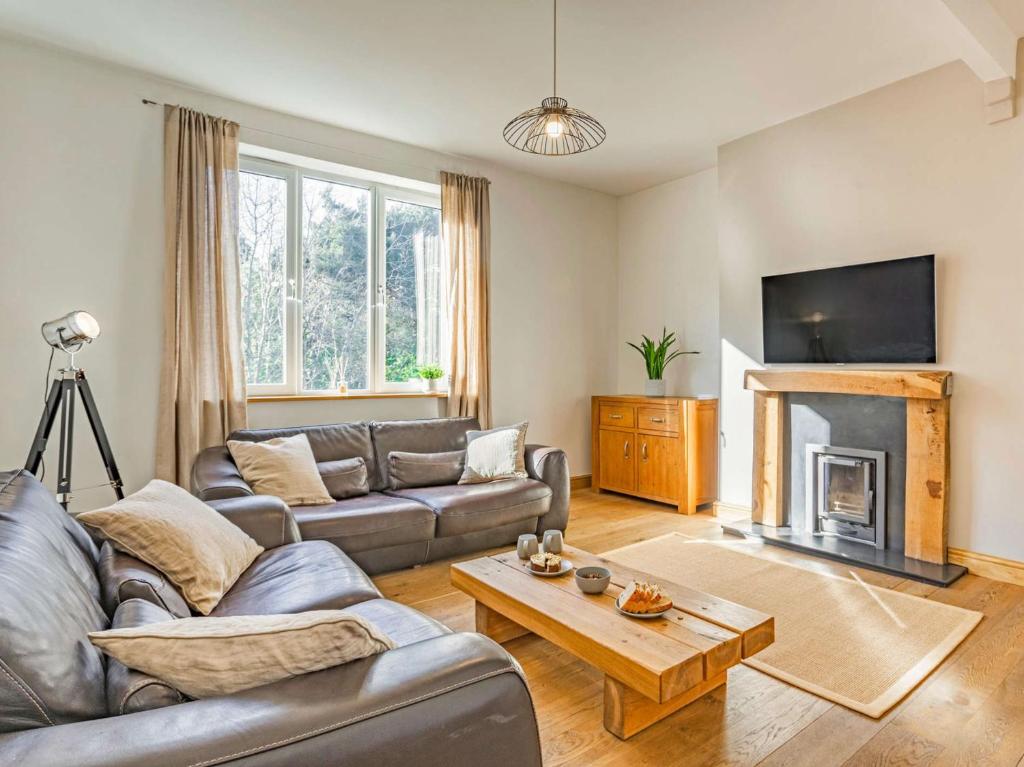 a living room with a couch and a fireplace at 2 bed in Harrogate 87817 in Harrogate