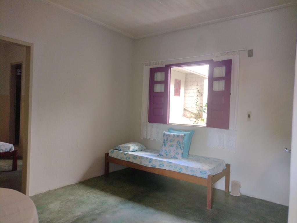 Postel nebo postele na pokoji v ubytování Residencial Ravasco