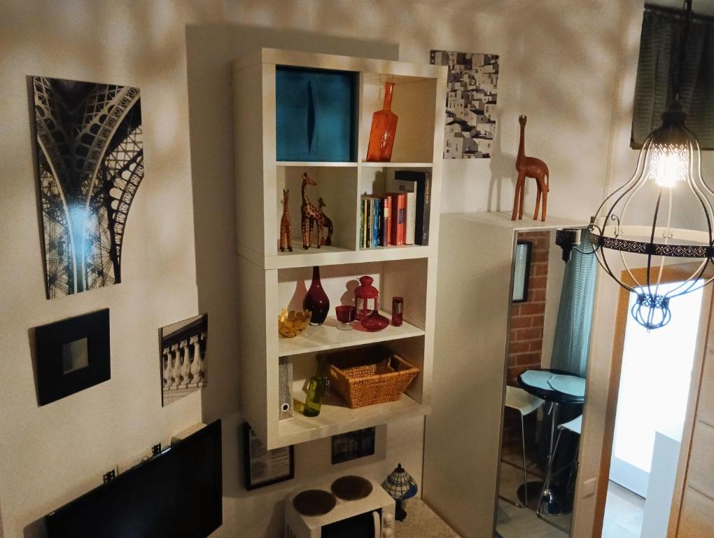 TV a/nebo společenská místnost v ubytování El Pozo-Villalobos Suite