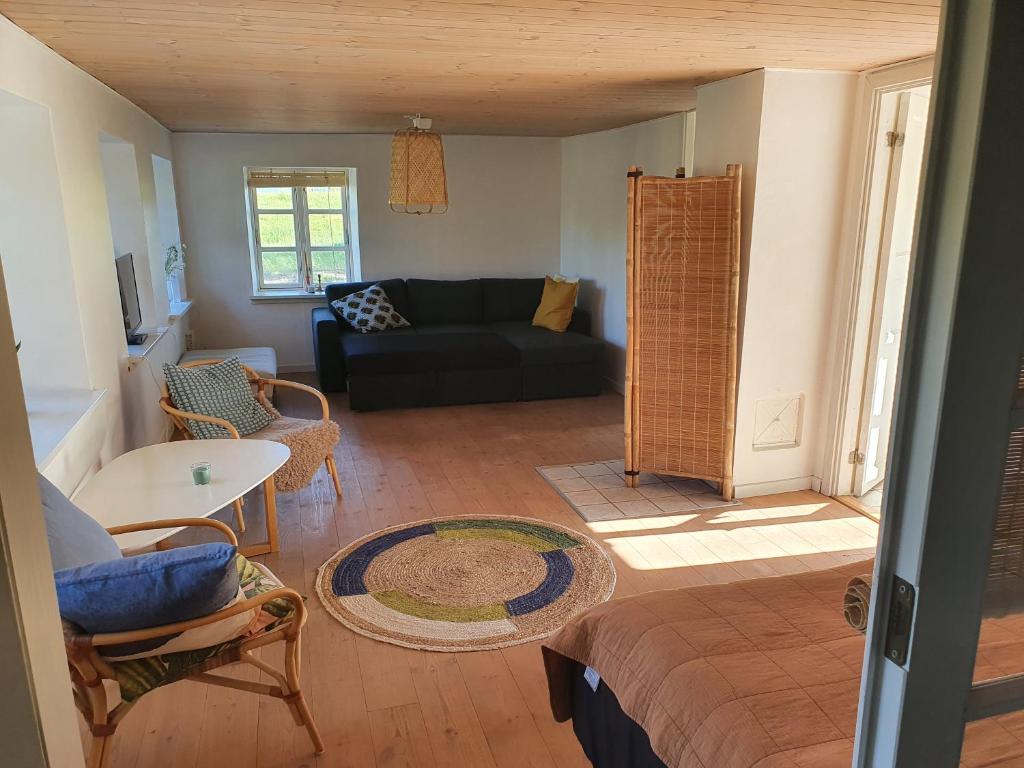 Posezení v ubytování Slotsgaardens feriegård.