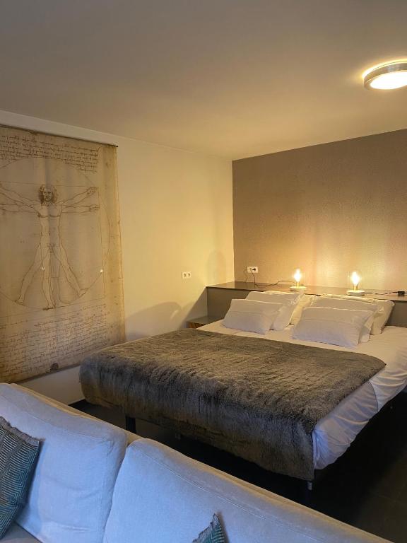 Postel nebo postele na pokoji v ubytování Studio & Appartement au Lac