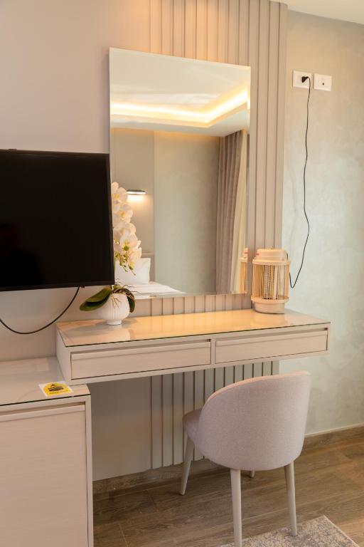 TV a/nebo společenská místnost v ubytování Nile Club hotel