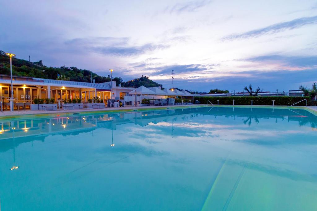 The swimming pool at or close to Girasole Eco Family Village