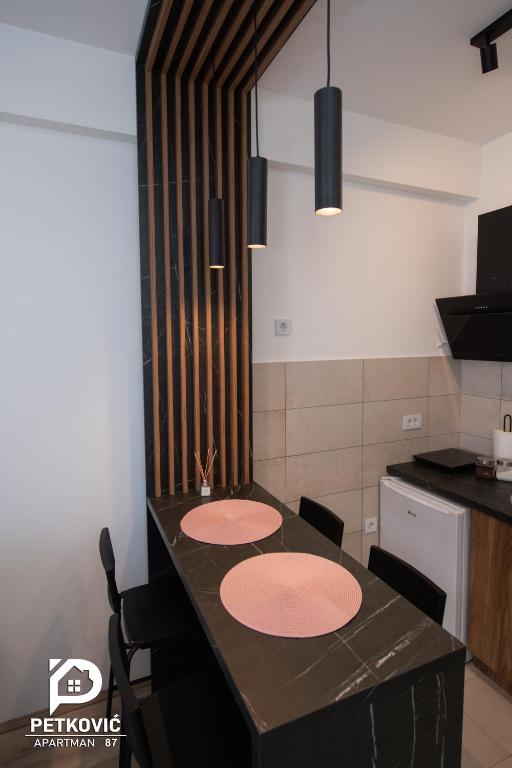 Kuchyň nebo kuchyňský kout v ubytování Petković apartmani 87