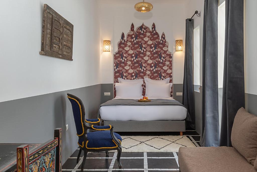 Postel nebo postele na pokoji v ubytování Riad la Parenthèse by Sashema