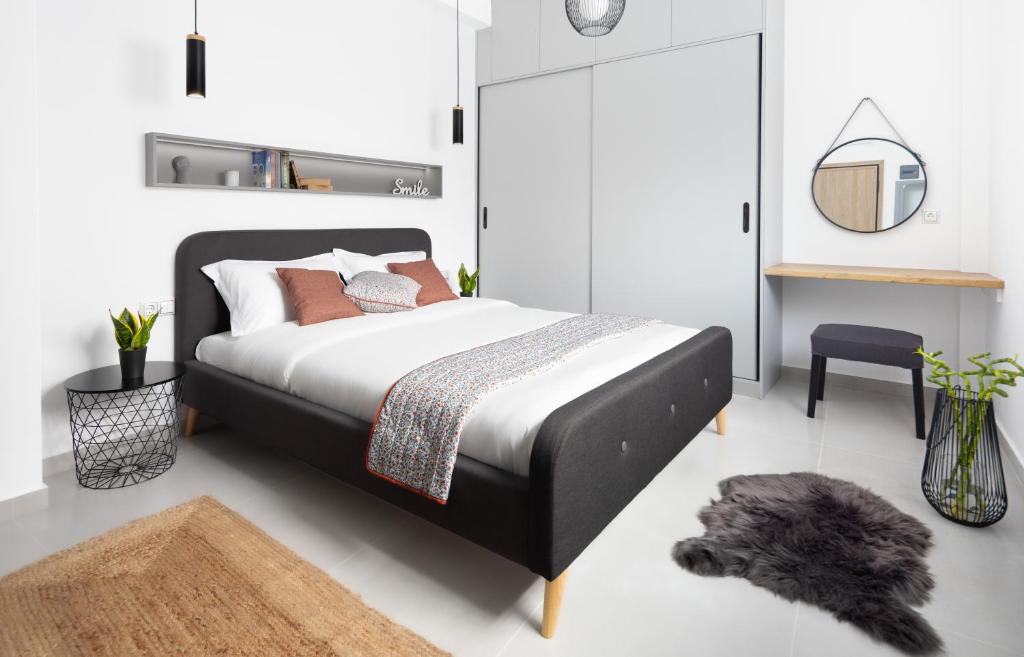מיטה או מיטות בחדר ב-Ando’s Cozy Studio Apartment