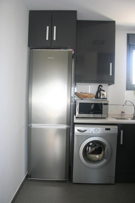 Kuchyň nebo kuchyňský kout v ubytování Apartment OasisBeach La Zenia