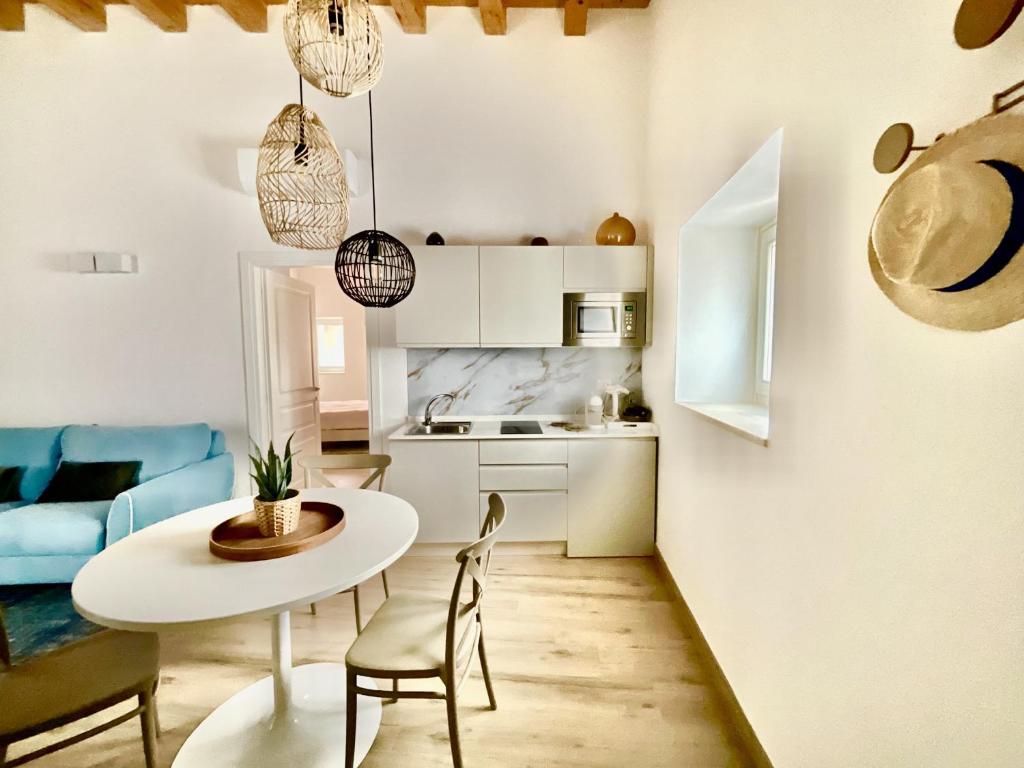 A kitchen or kitchenette at Rua 39 fine apartments by Dimore in Sicily