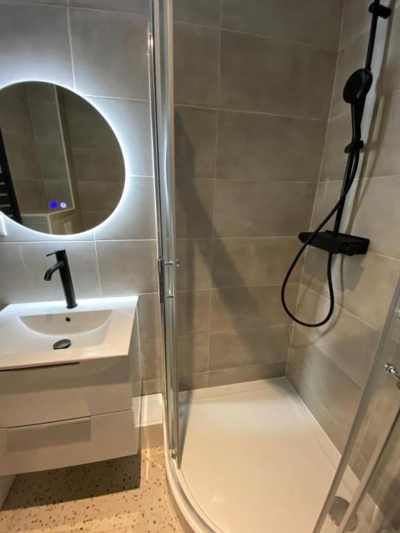 Ванная комната в L'Escale Appartements et Suites en bord de Mer