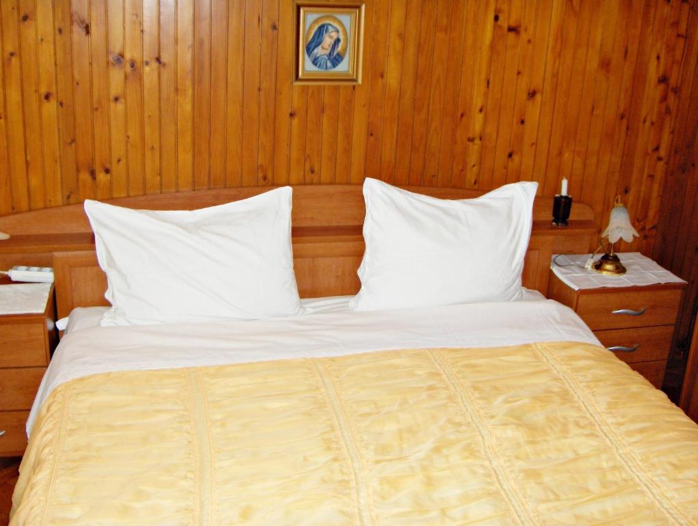 Postel nebo postele na pokoji v ubytování Guest House Roza