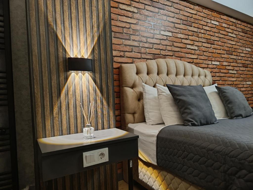 Ένα ή περισσότερα κρεβάτια σε δωμάτιο στο Nomad Hub Istanbul Residence