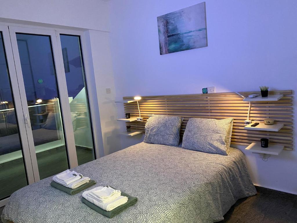 Krevet ili kreveti u jedinici u okviru objekta Ev Zin - Modern, cozy, 1 bed, pool, 2 balconies, A105