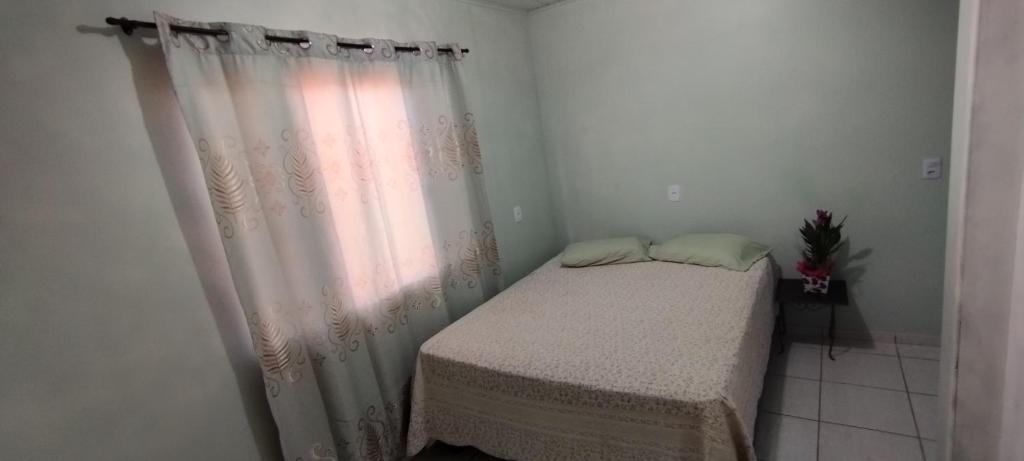 Postel nebo postele na pokoji v ubytování Hotel Pousada e Parada Colonial