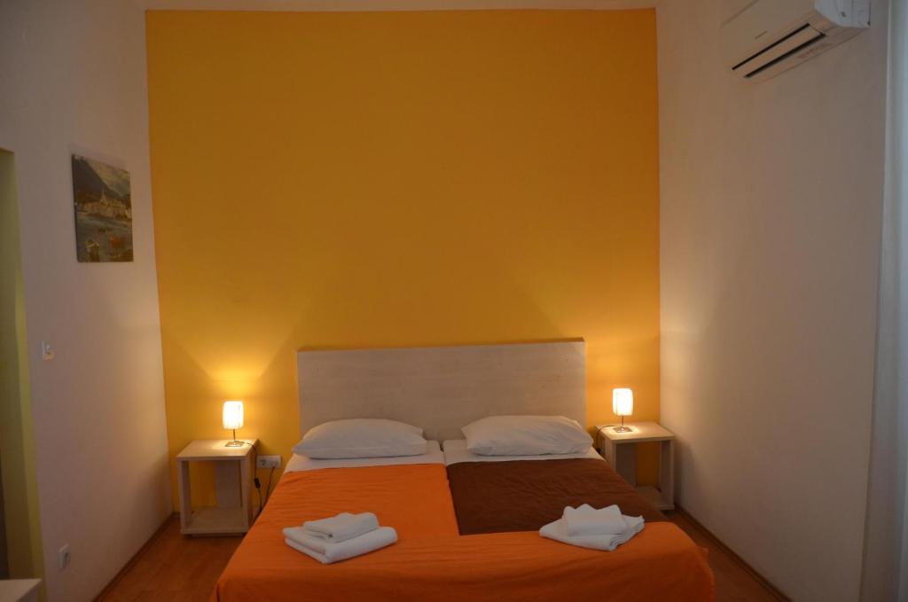 Postel nebo postele na pokoji v ubytování Hotel Borik