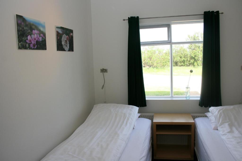 Postel nebo postele na pokoji v ubytování Jadar Farm