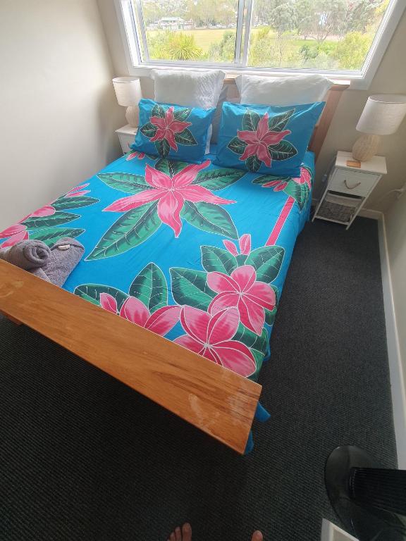 Postel nebo postele na pokoji v ubytování Stanmore Bay Beach House