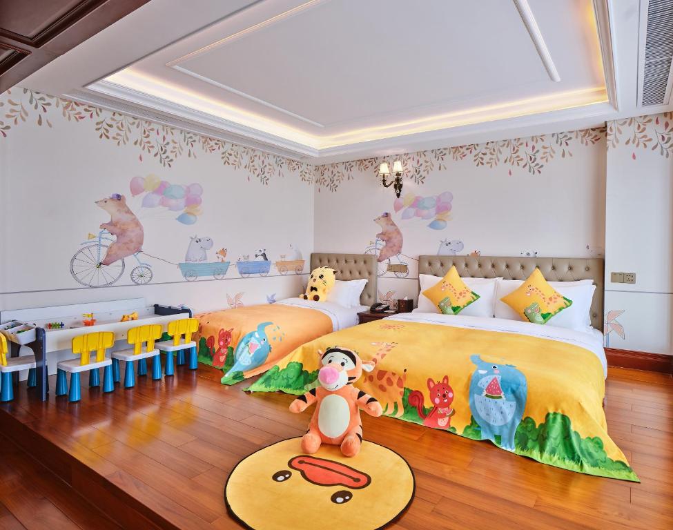 Postel nebo postele na pokoji v ubytování Guangming CIMC Executive Hotel Shenzhen