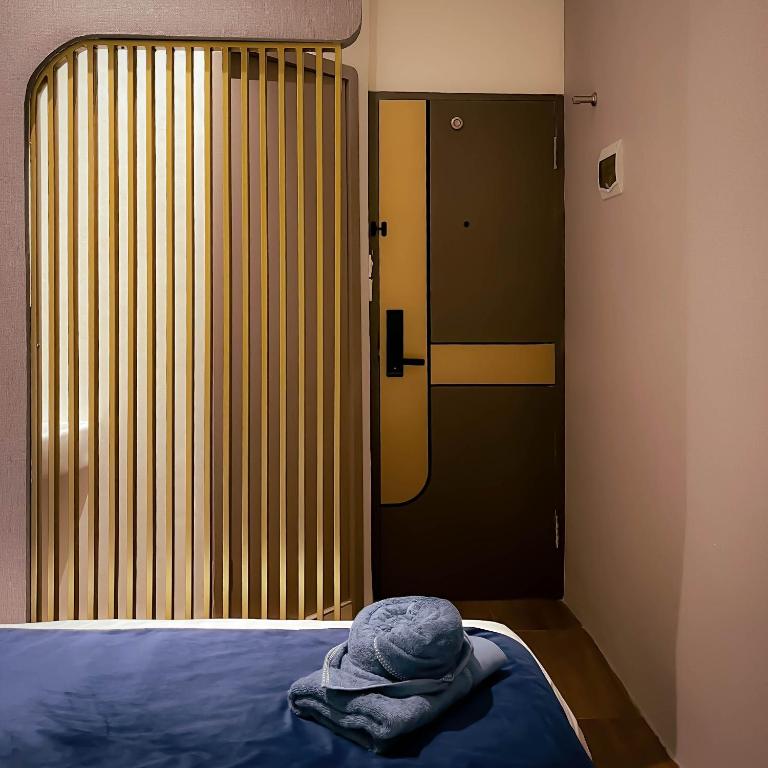 Postel nebo postele na pokoji v ubytování Qube Hotel by 98hospitality