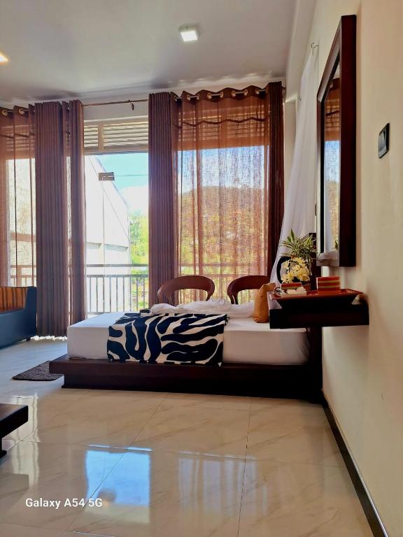 Posezení v ubytování Ella Odyssey Inn