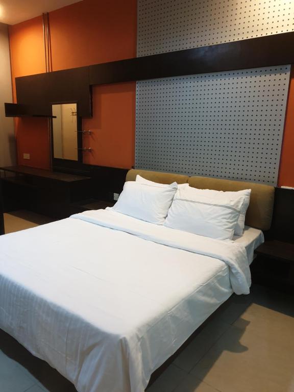 Ένα ή περισσότερα κρεβάτια σε δωμάτιο στο Chor Residence Homestay
